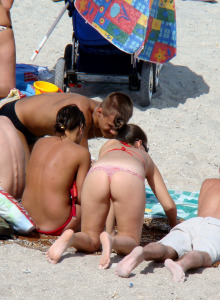 Hot candid in bikinis surfing and sunbathing teens!