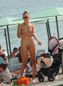 Girl not shy being nude at the beach