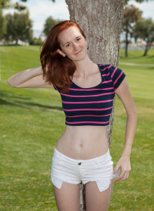 Redhead Dee Dee Lynn wears tight white shorts outside